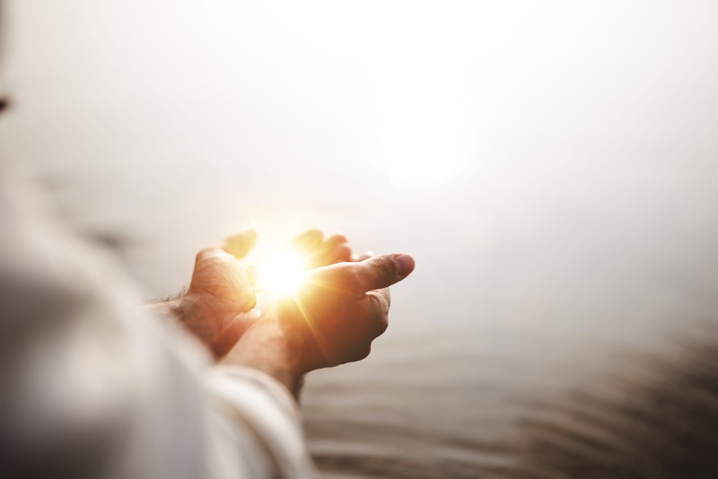A,Beautiful,Shot,Of,Jesus,Christ,Holding,Hope,And,Light